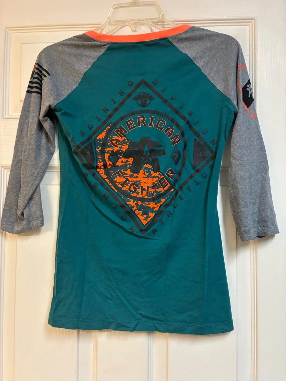 2 American Fighter women’s small/ XS 3/4 Sleeve Raglan Tee’s Teal & Orange